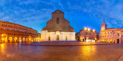 Fototapeta na wymiar Panorama of Piazza Maggiore square with Basilica di San Petronio and Palazzo d'Accursio or Palazzo Comunale at night, Bologna, Emilia-Romagna, Italy