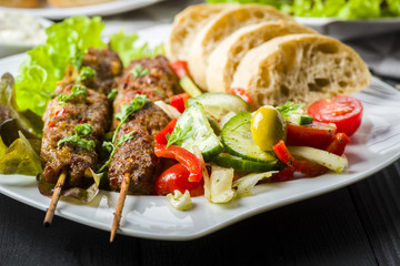 Skewers of minced meat