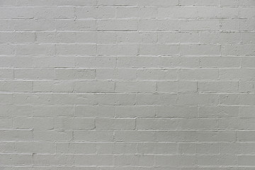 Old grey brick wall background texture