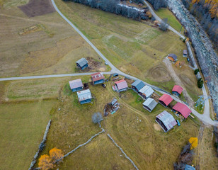 Aerial view of cottage in Swiss mountains in fall season