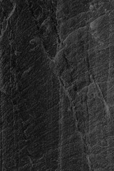 Dark grey black slate background or texture.