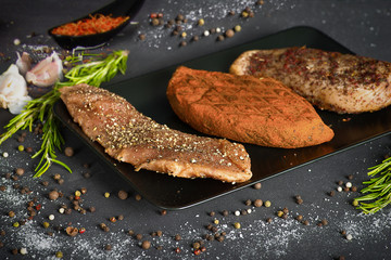 on black rectangular plate the cut meat