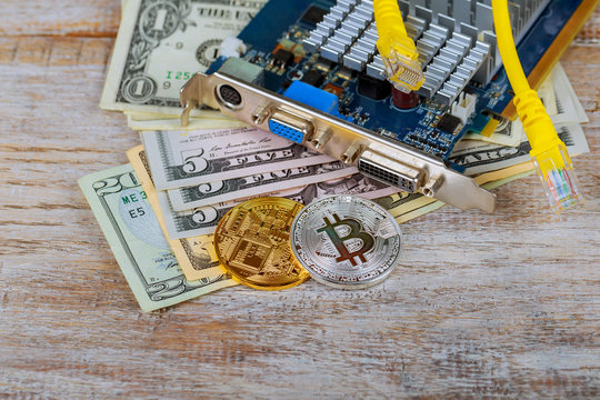 Golden bitcoin coins on a paper dollars money Virtual currency.