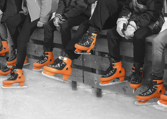 Teenagers in orange skate