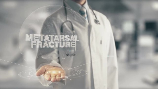 Doctor holding in hand Metatarsal Fracture
