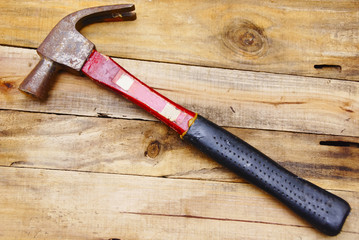 Hammer Tool Over Wooden Background