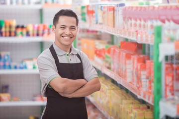 male staff working at super market
