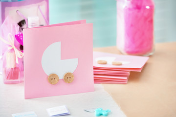 Thank you cards for baby shower party on wooden table