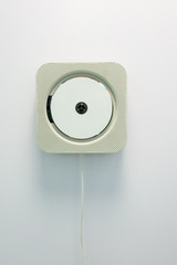 Wall mounted CD player isolated on white