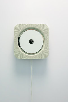 Wall mounted CD player isolated on white