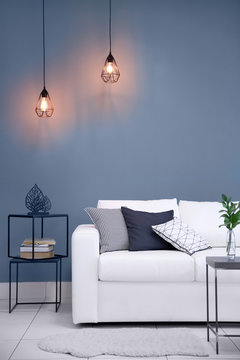 Modern room design with white sofa