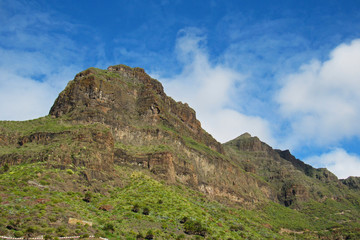 Fototapeta na wymiar Mountain cliff on blue sky at Masca - Tenerife