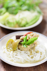 Thai food, rice vermicelli noodles with green curry chicken