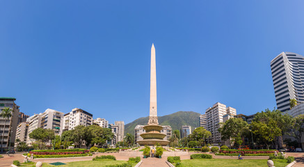 Panoramic view of Altamira's Obelisk on a sunny day with blue skies in Francia Square (A.k.a. Plaza...