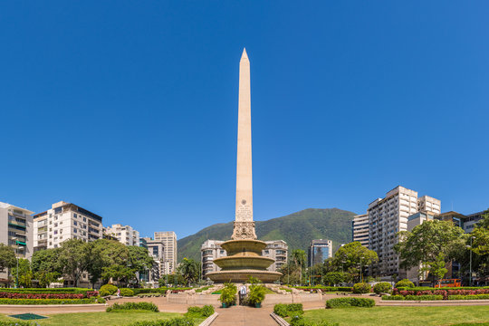 Panoramic view of Altamira's Obelisk on a sunny day with blue skies in Francia Square (A.k.a. Plaza Altamira), in venezuelan capital city Caracas, in 2017.