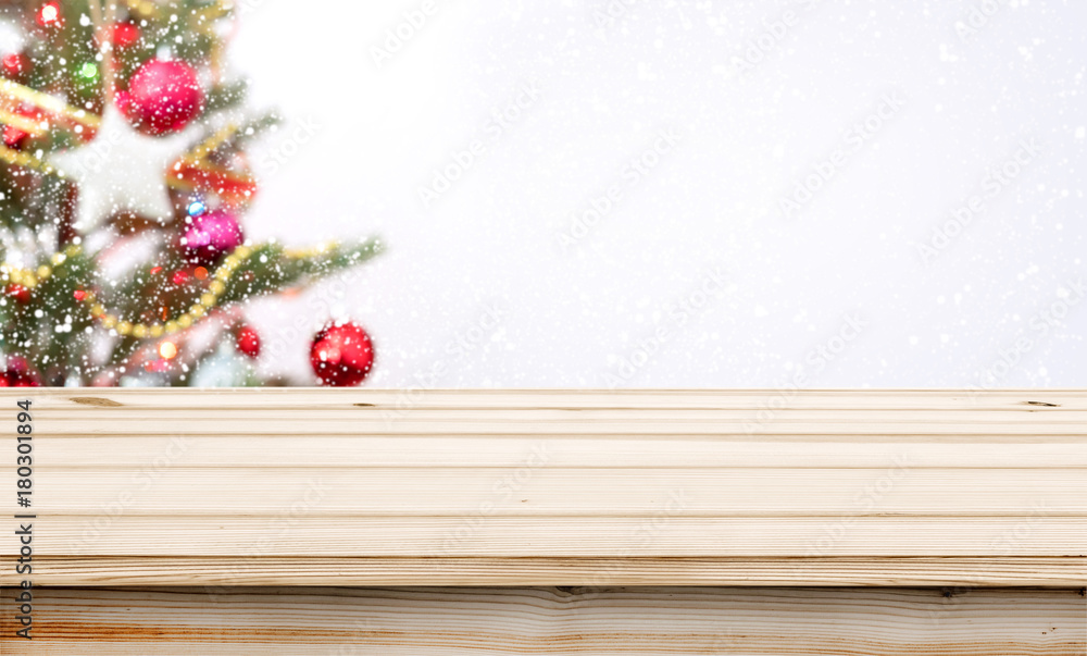 Canvas Prints christmas and new year background with empty wooden deck table over christmas tree and blurred light