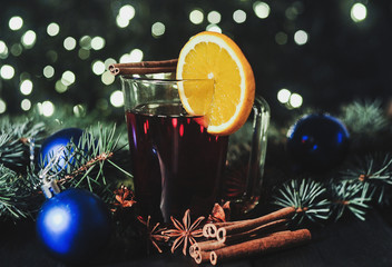 Fototapeta na wymiar Mulled wine on a christmas background 