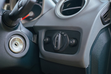 Fototapeta premium Light switch in car,close up