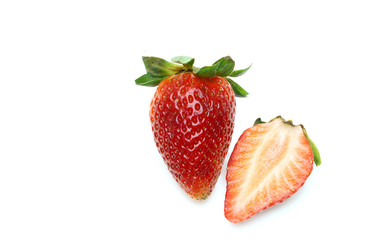 A sliced strawberry and a fresh strawberry on white background ,isolated