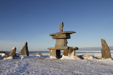 Set of rocks and a inuksuk and inukshuk found in early November near Churchill, Manitoba