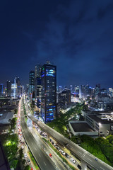 Fototapeta na wymiar Flyover and skyscrapers in Kuningan CBD Jakarta