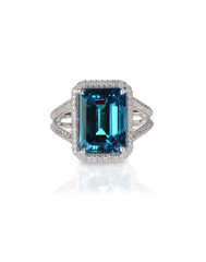 aquamarine center stone ring with diamond halo isolated on white
