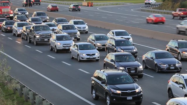 Busy traffic at the rush hour on a highway in Toronto. Province of Ontario, Canada