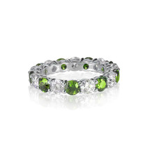 green emerald and diamond wedding band ring isolated on white