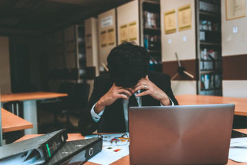 Asian stress business man working fail,The owner of the company blamed him with bad word,Thai employee serious from hard work from boss,Sad handsome guy in black suit