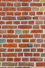 old brick wall with multi-colored bricks