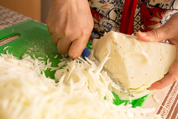 salting cabbage at home in the kitchen