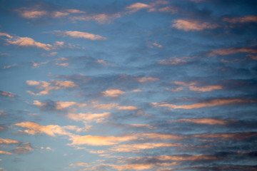 clouds in the sun at sunset as background