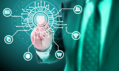 Businessman clicking on the center of a circuit panel with a shield