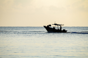 beauty in nature, silhouette traditional fisherman going to catch fish at early morning with his boat
