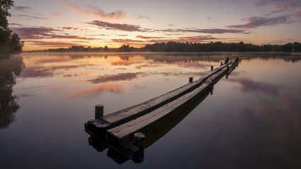 dawn on the lake,wooden pier