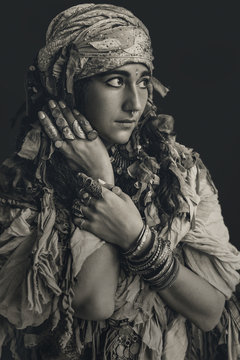 gypsy style young woman wearing tribal jewellery portrait