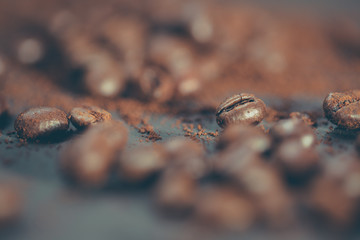 Coffee beans close up. Photo in instagram, vintage style with shallow depth of field.