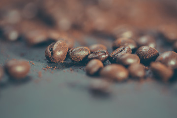 Coffee beans close up. Photo in instagram, vintage style with shallow depth of field.