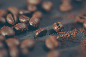 Obraz premium Coffee beans close up. Photo in instagram, vintage style with shallow depth of field.