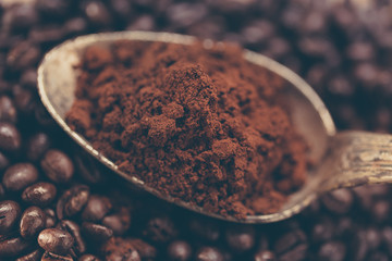 Preparing coffee close up. Photo filtered in vintage style.