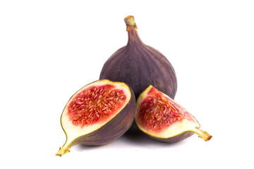 Fresh figs. Fruit with half and quarter isolated on white background.