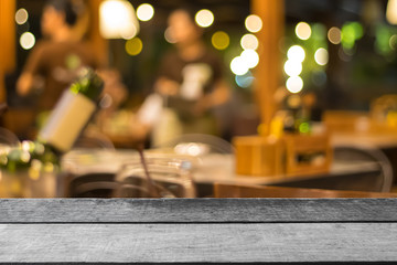 Vintage wooden table on front blurred restaurant light background