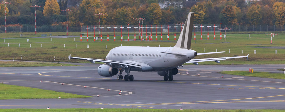 airplane at an airport runway