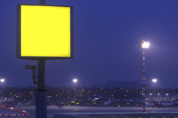 plain airport sign in the evening