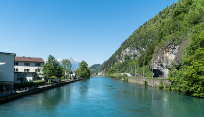 Fototapeta na wymiar Scenery of Swiss city of Interlaken on Brienz lake