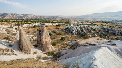 Goreme village, Turkey. Rural Cappadocia landscape. Stone houses of Cappadocia.