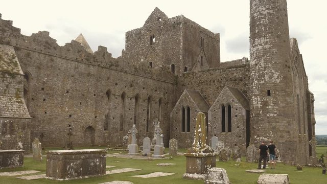 Tourist visiting the Rock of Cashel, Ireland
