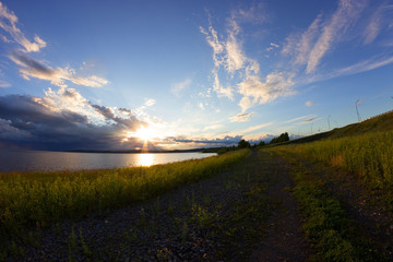 paved country road with beautiful sky