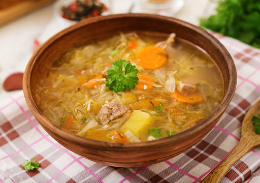 Traditional Russian soup with cabbage - sauerkraut soup.