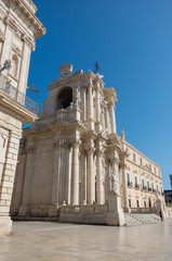 Obraz premium Baroque style Cathedral in piazza Duomo. Ortiga island, Syracuse city, in Sicily. The city is a historic town in Sicily, the capital of the province of Syracuse.